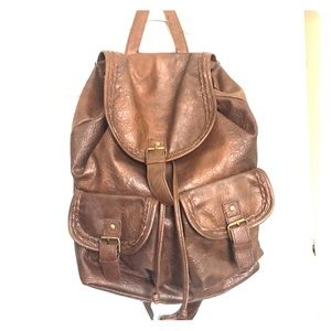 Faux brown leather back pack w/braid details